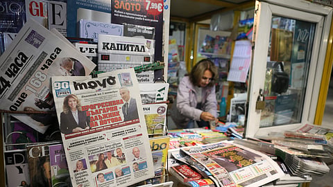 Front pages of Bulgarian newspapers display the results of the first round of the presidential election in Sofia, Bulgaria, Monday, Oct. 26, 2026, as incumbent leftist Iliana Yotova and pro-Western reformist Andrey Gyurov advance to a Nov. 1 runoff following record-low voter turnout amid widespread political distrust.