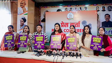 All India Mahila Congress (AIMC) President Alka Lamba holds a poster titled 'Chalo Dilli' during a press conference in Shimla, Monday, Oct. 26, 2026.