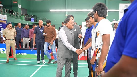 Dr G Parameshwara taking part in the inauguration of an international badminton tournament along with former MLA Kumar Bangarappa in Bengaluru on Tuesday.