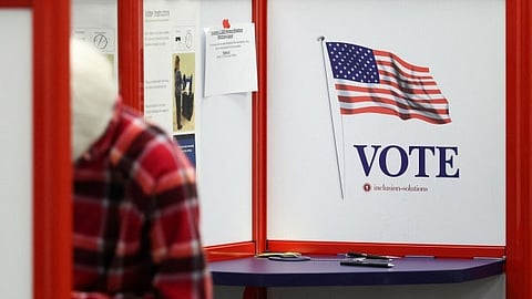 A voter fills out a ballot in the general election during early voting at the Hamilton County Board of Elections, Friday, Oct. 9, 2026, in Norwood, Ohio.