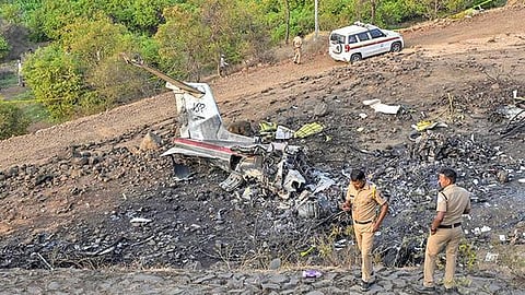 Wreckage of crash plane Learjet 45 seen on the accident spot near Baramati airfield after the plane crash on January 28, 2026.