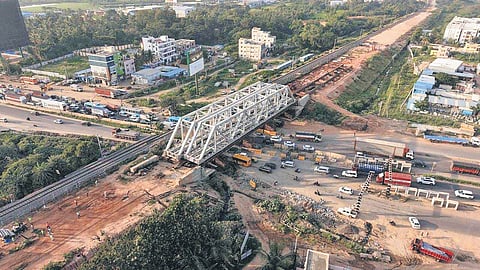 Weighing around 245 tonnes each, the girders would allow road and rail traffic to move independently