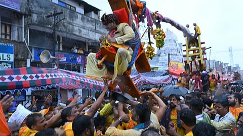 Temple hereditary priest Bantupalli Venkatrao blessed the devotees by sitting on the Sirimanu on behalf of the goddess Pydimamba in the Sirimanotsavam procession in Vizianagaram.