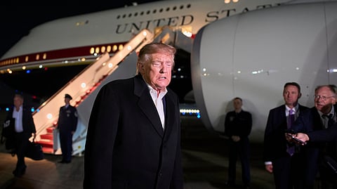 President Donald Trump speaks with reporters as he arrives on Air Force One, Wednesday, Oct. 28, 2026, at Joint Base Andrews, Md.