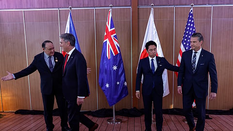 Japan Defense Minister Shinjiro Koizumi and U.S.Defense Secretary Pete Hegseth prepare to leave after posing for pictures before holding a Quadrilateral Meeting on the sidelines of the 20th Association of Southeast Asian Nations (ASEAN) Defence Ministers' Meeting (ADMM) and 13th ADMM-Plus Meetings in Cebu, Philippines.