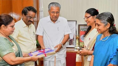Justice Hema and other members of committee submitting report to chief minister