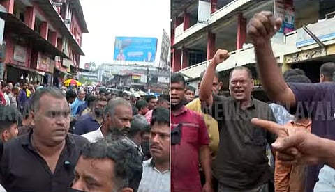 കല്ലുത്താന് കടവിലെ പുതിയ കെട്ടിടത്തിലേക്ക് മാറാന് തയ്യാറല്ല; കരിദിനം ആചരിച്ചും മനുഷ്യച്ചങ്ങല തീര്ത്തും പ്രതിഷേധിച്ച് വ്യാപാരികള്