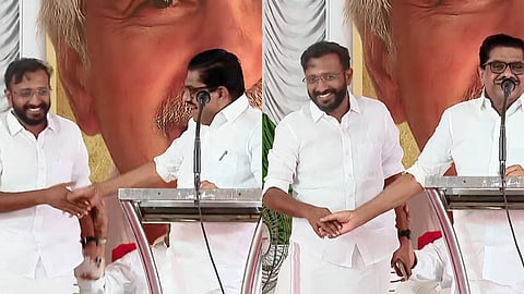 V.M. Sudheeran invites Aloysius Xavier to the stage