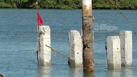 Private shipyards encroach upon and block the boat channel at Vypeen Kalamukku Harbour