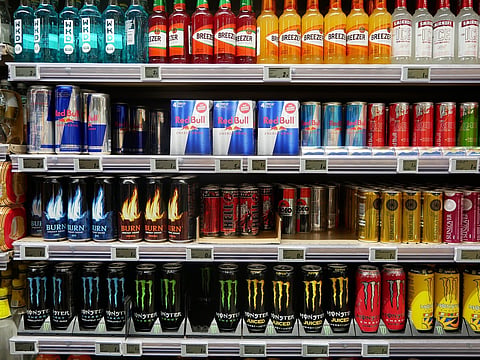 Delhi High Court stays FSSAI's ban on the 'energy drink' descriptor for PepsiCo, Monster, and Reliance. Read the full analysis of caffeine limits, health risks, and marketing controversy.