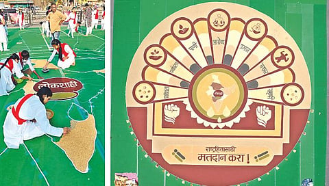 नाशिक : "राष्ट्रहितासाठी मतदान करा" हा संदेश भरडधान्य भव्य महारांगोळीतून साकारतांना महिला. (छाया : हेमंत घोरपडे)