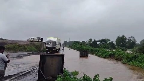 Flood Water On National Highway At Mangur