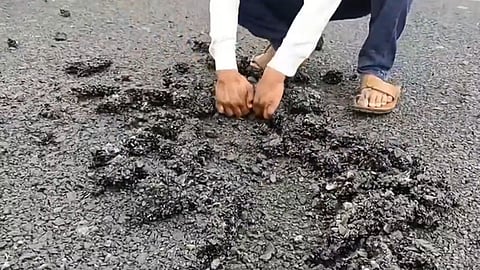 man easily dismantled a recently built road with his hands revealing poor construction quality in nanded maharashtra video viral