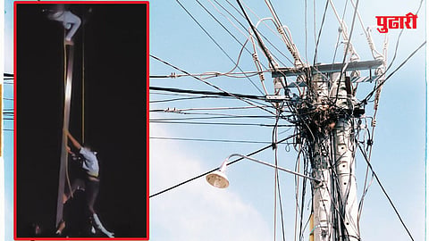 Man on electric pole in Beed