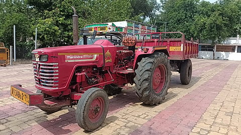 Tractor transporting illegal sand