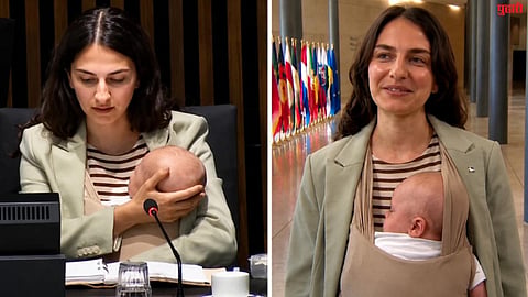 Swedish minister delivers speech with three-month-old baby in Luxembourg.