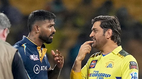 Gujarat Titans captain Hardik Pandya with Chennai Super Kings captain MS Dhoni