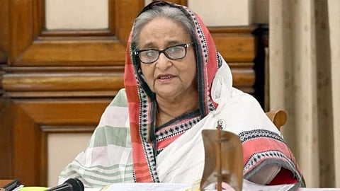 sheikh hasina will return as prime minister awami league leader says