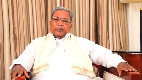 karnataka cm siddaramaiahs assets worth rs 100 crore frozen in muda case
