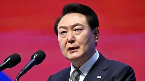 south korea court issues arrest warrant for impeached president