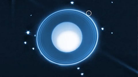 hidden moon orbiting in Uranus