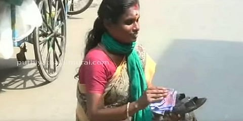 கோயில் வாசலில் காலணிகளை துடைத்து பரப்புரையில் ஈடுபட்ட பெண் கைது