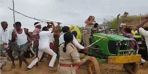 பெண் வனத்துறை அதிகாரியை கட்டையால் தாக்கிய எம்எல்ஏ உறவினர் ! - வீடியோ