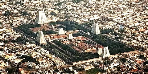 ஸ்ரீரங்கம் கோவிலின் 1 கி.மீ சுற்றளவில் கட்டடங்கள் கட்ட அனுமதி வழங்கியது எப்படி?–நீதிமன்றம்