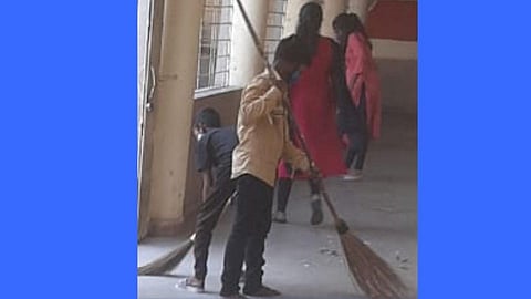 student cleaning premises of navi mumbai croporation school.