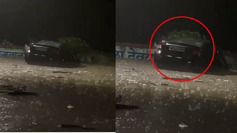 Heavy Rain In Pune Car washed away in flood water in Wanwadi