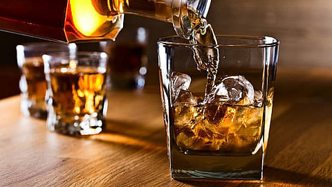 women beats liquor store owner