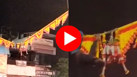 Man Broke Dahi Handi By Hanging On Rope