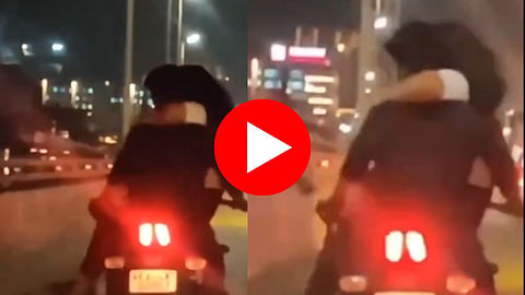 Riding Bike With Girlfriend in His Lap Video Viral