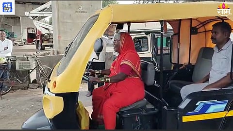 Elderly woman driving rickshaw