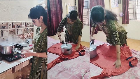 കുക്കര് ഉപയോഗിച്ച് തുണി തേച്ച് വീട്ടമ്മ