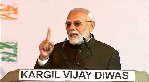 Narendra Modi speaks during a program to commemorate the 25th anniversary of the Kargil Vijay Diwas