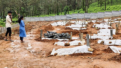 Shruthi and Jenson at the Puthumala graveyard, in Wayanad.
