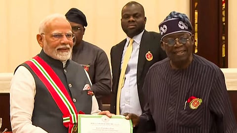: Prime Minister Narendra Modi being conferred with Nigeria's second-highest national award Grand Commander of the Order of the Niger by President of Nigeria Bola Ahmed Tinubu