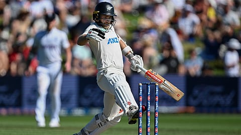 Kane Williamson kicks ball onto stumps