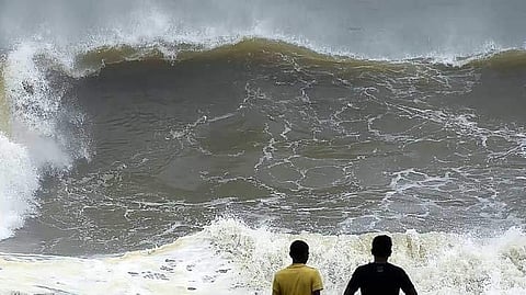 warning in four districts; possibility of high waves