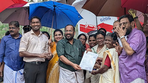 Revenue Minister K Rajan distribute land
deeds to 44 families