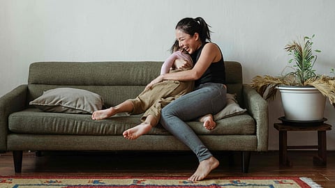 mother hugs child