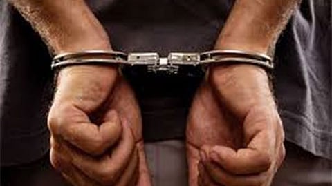 handcuffs locked on hands