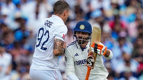 Ravindra Jadeja collides with England's Brydon Carse