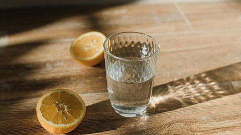 lemon and water in a glass