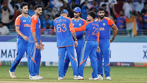 Fellow players congratulate Kuldeep