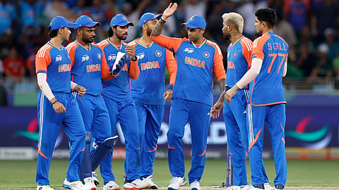 Suryakumar Yadav celebrates wicket with his teammates