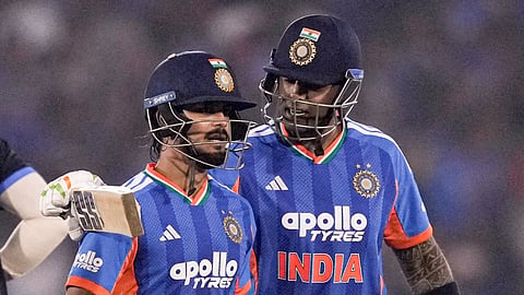 India's captain Suryakumar Yadav with teammate Ishan Kishan