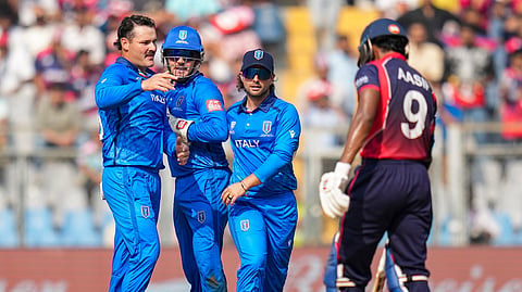 Italy's players celebrate the wicket of Nepal's Aasif Sheikh during the ICC Men's T20 World Cup 2026 cricket match