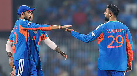 Varun Chakravarthy celebrates his wicket